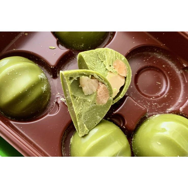 Meiji-Matcha-Chocolate-Covered-Macadamia-Nuts-Snack-9-Pieces-4-2024-10-02T07:45:12.301Z.jpg