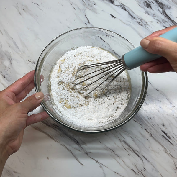 mixing the wet and dry ingredients together