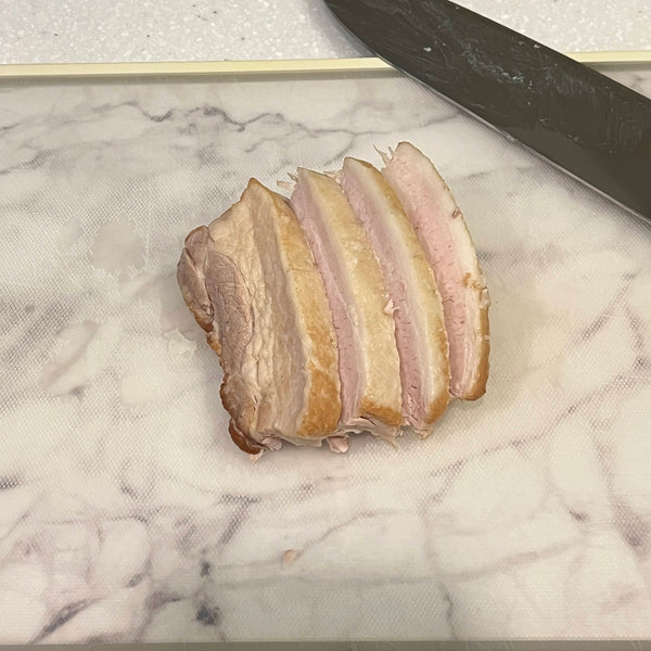 cutting the pork belly blocks into smaller pieces